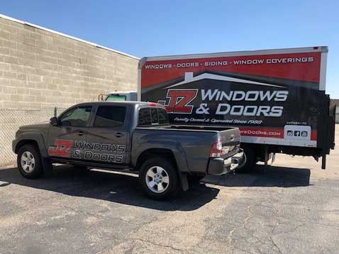 Company vehicles parked next to each other